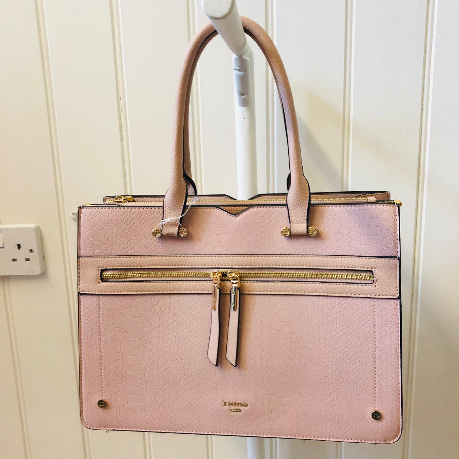 Pale pink handbag on sale