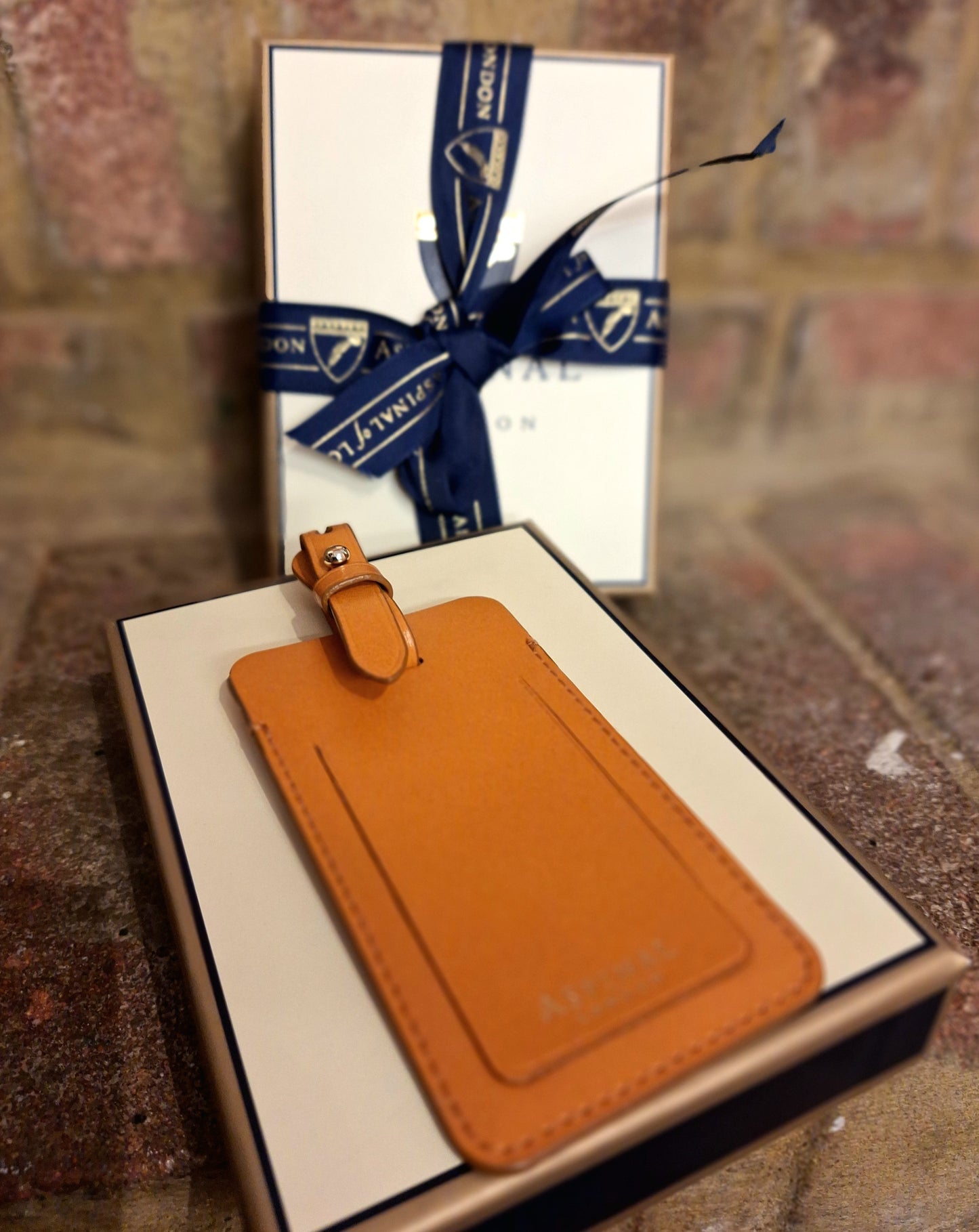 Aspinal tan luggage tag